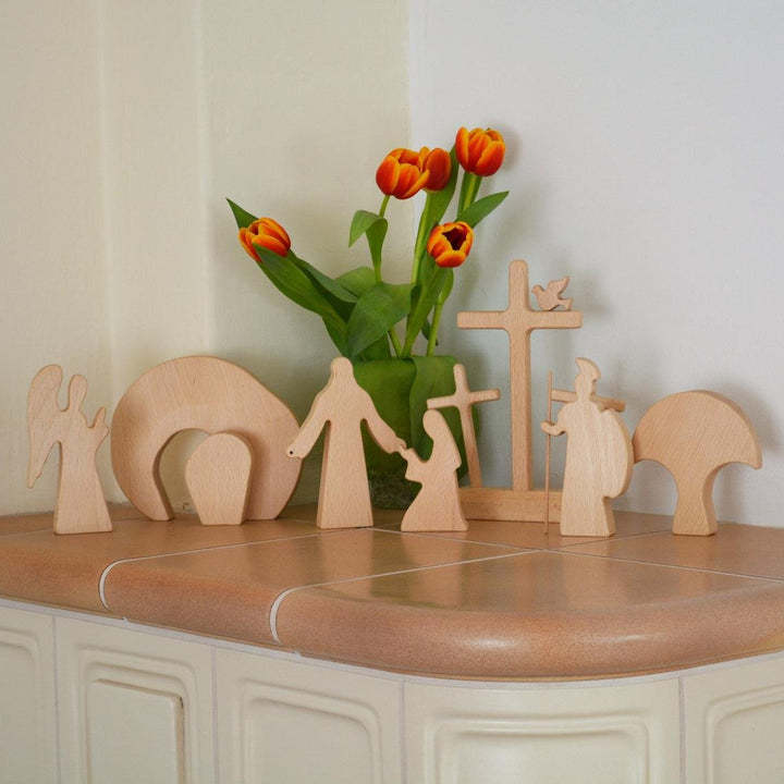 The Easter Scene Is Decorated In Wood